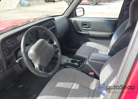 1999 Jeep Cherokee Classic/Sport from USA, damaged, VIN 1J4FT68S4XL604177